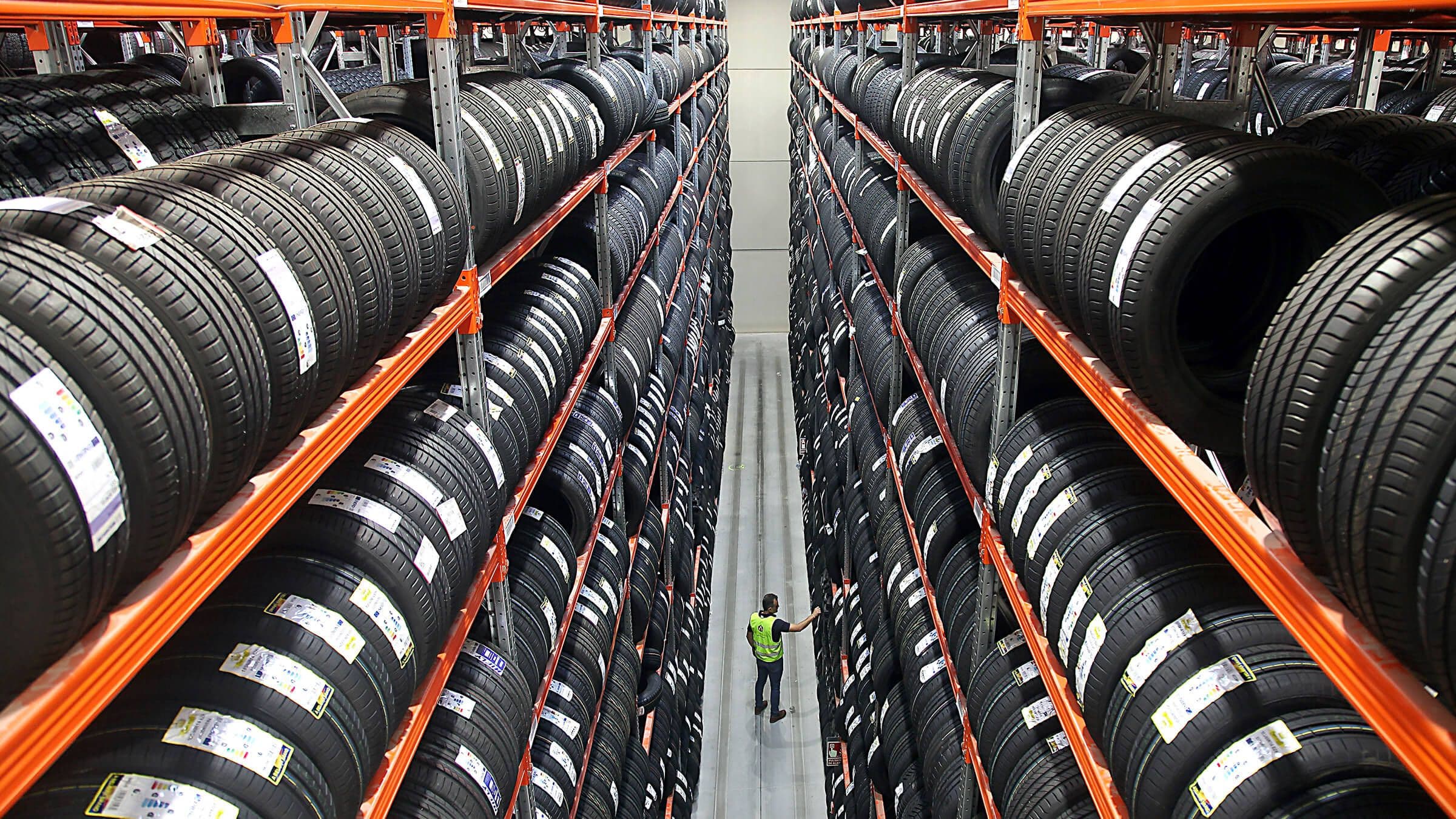 Tire warehouse with racks full of tires